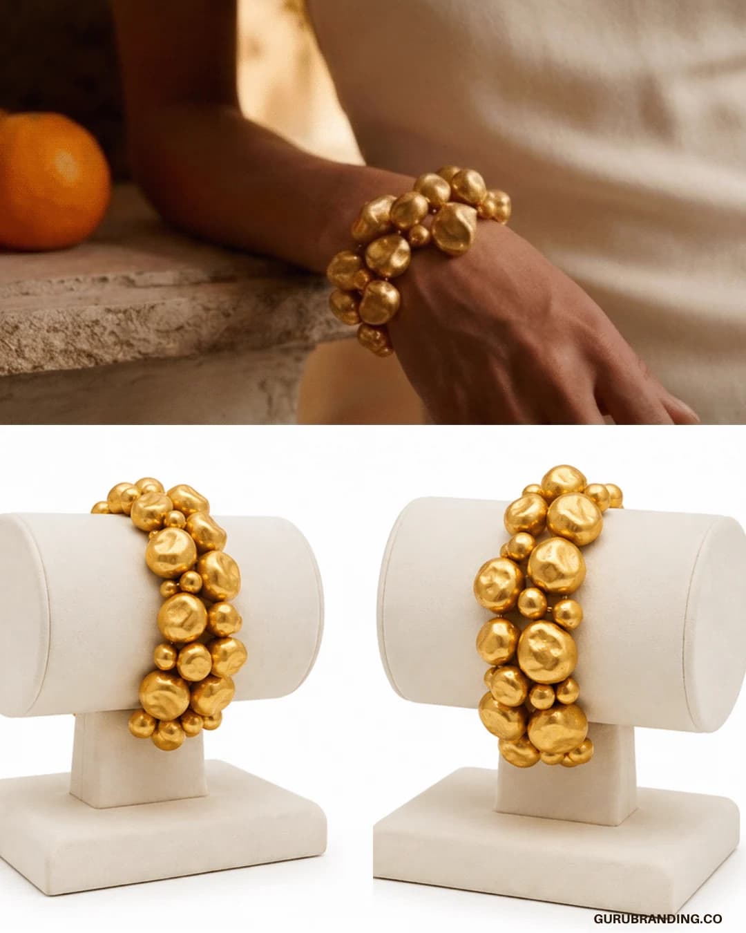 The gold bracelet worn beside an orange, above the piece on display busts
