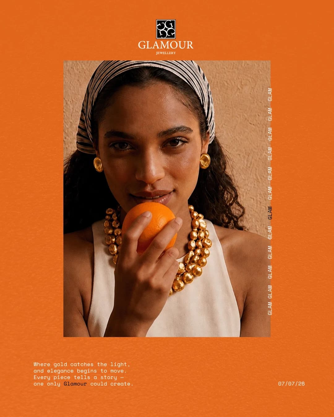 Orange Glamour poster of the model in a headscarf holding an orange