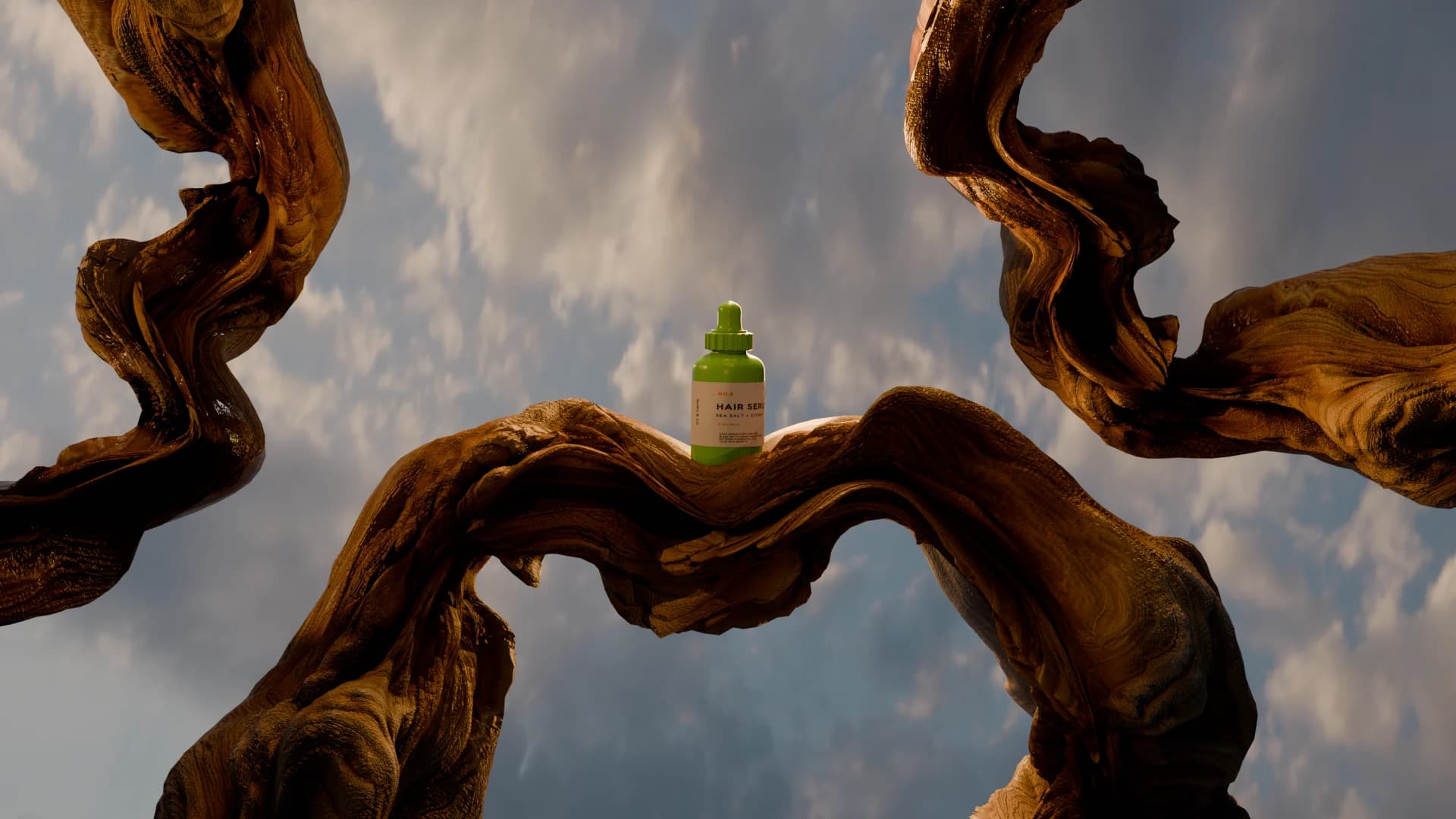 Hair serum bottle resting on a driftwood arch against a cloudy sky