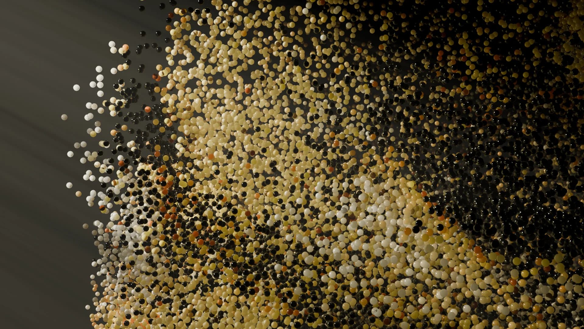 Dense field of scattered gold and white spheres forming a relief